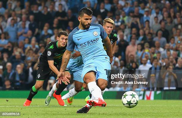 Sergio Aguero of Manchester City scores from the spot during the UEFA Champions League match between Manchester City FC and VfL Borussia...