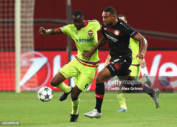 Jonathan Tah of Bayer Leverkusen and Lacina Traore of CSKA Moscow battle for the ball during the UEFA Champions League match between Bayer 04...