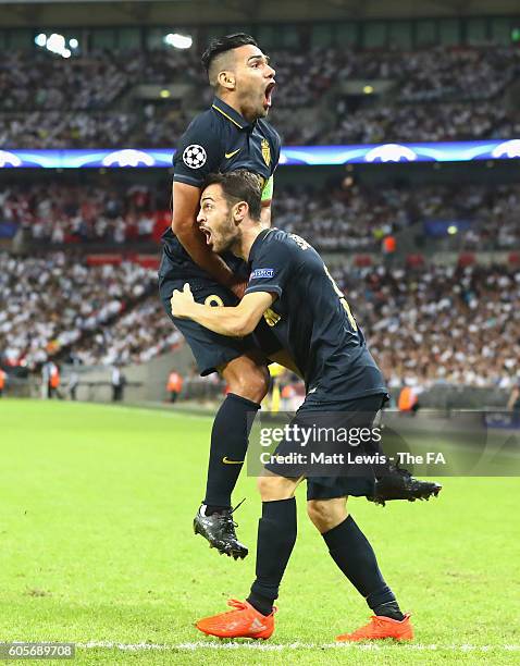 Radamel Falcao Garcia and Bernardo Silva of AS Monaco celebrate during the UEFA Champions League match between Tottenham Hotspur FC and AS Monaco FC...