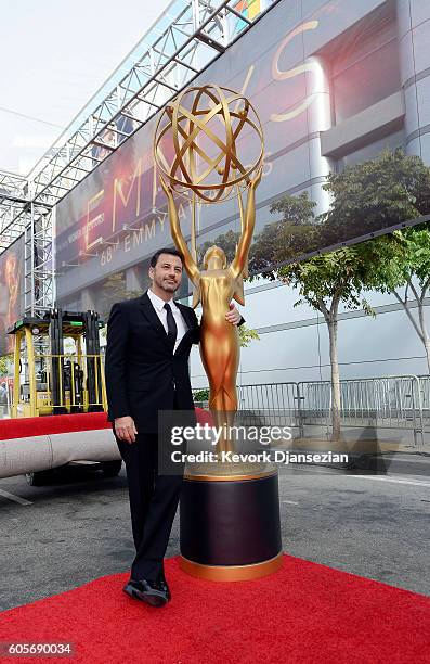 Host Jimmy Kimmel poses with an Emmy statuette during red carpet roll out of he 68th Emmy Awards press preview day at Microsoft Theater on September...