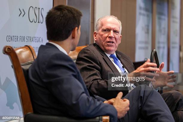 Director John Brennan speaks during a panel discussion moderated by National Security Division Deputy Assistant Attorney General Stuart J. Evans...