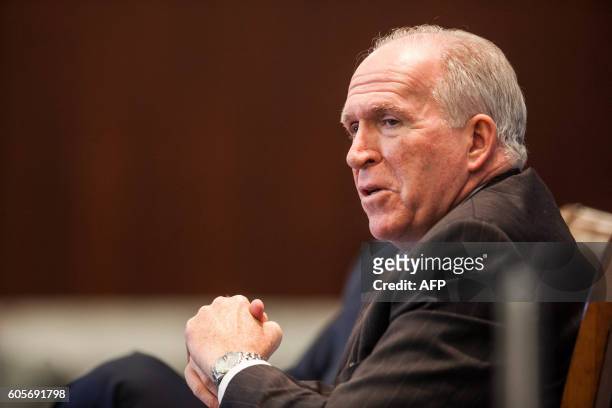 Director John Brennan speaks during a panel discussion moderated by National Security Division Deputy Assistant Attorney General Stuart J. Evans...