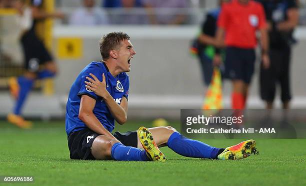 An injured Bjorn Engels of Club Brugge holds his shoulder during the UEFA Champions League match between Club Brugge and Leicester City at Jan...