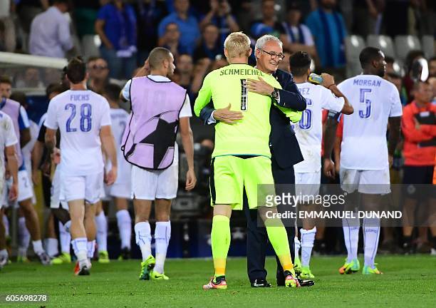 Leicester City's coach Claudio Ranieri celebrates at the end of the UEFA Champions League football match between Club Brugge and Leicester City at...