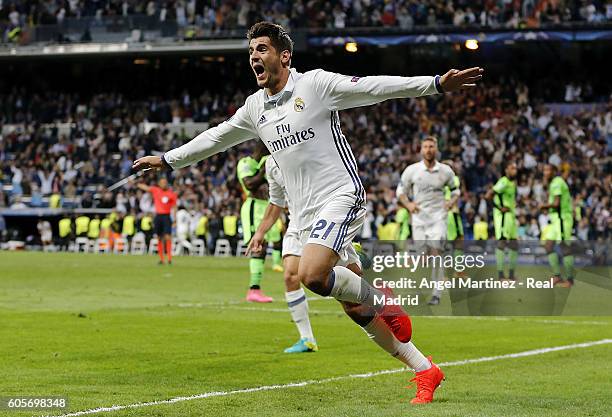 Alvaro Morata of Real Madrid celebrates after scoring his team's second goal during the UEFA Champions League Group F match between Real Madrid CF...