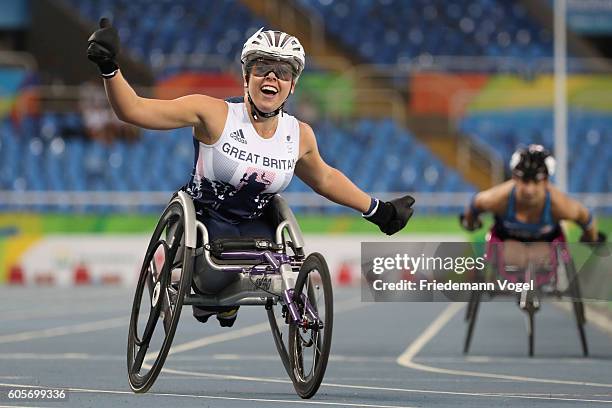 Hannah Cockroft of Great Britain celebrate winning the gold medal in the Women's 400m - T34 Final on day 7 of the Rio 2016 Paralympic Games at the...