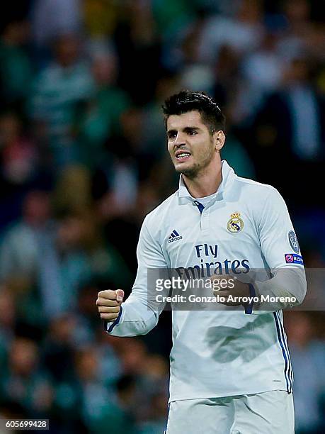 Alvaro Morata of Real Madrid CF celebrates after winning the UEFA Champions League group stage match between Real Madrid CF and Sporting Clube de...