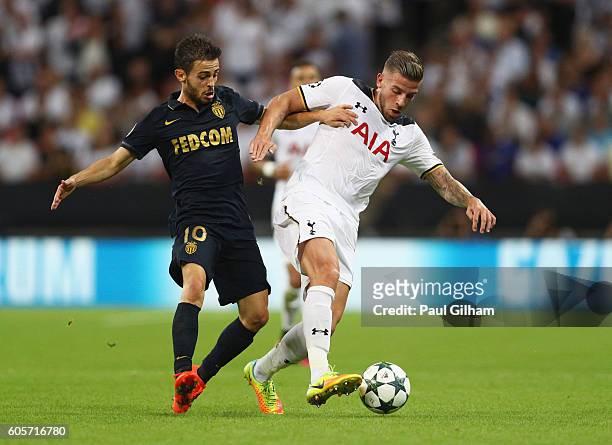 Vincent Janssen of Tottenham Hotspur battles for the ball with Bernardo Silva of AS Monaco during the UEFA Champions League match between Tottenham...