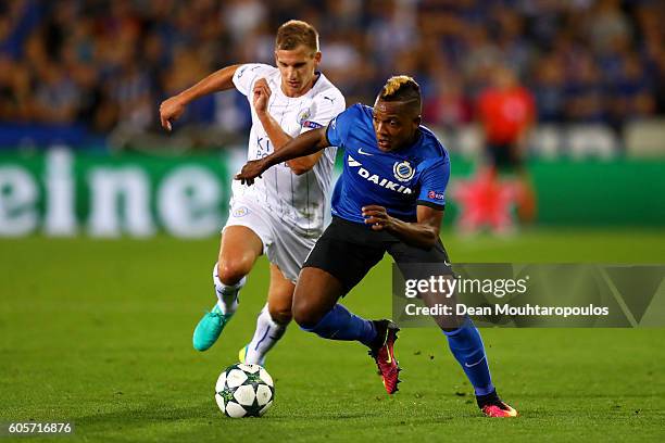 Jose Izquierdo of Club Brugge is chased by Marc Albrighton of Leicester City during the UEFA Champions League match between Club Brugge KV and...