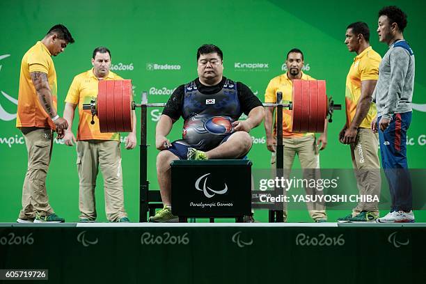 South Korea's Keun Bae Chun concentrates during the men's powerlifting +107 kg at the Paralympic Games in the Riocentro in Rio de Janeiro, Brazil on...