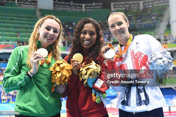 Bronze medallist Ellen Keane of Ireland, gold medallist Katarina Roxon of Canada and Silver medallist Claire Cashmore of Great Britain pose after...