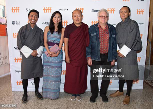 Actor Tshering Dorj, actor Sadon Lhamo, director Khyentse Norbu, executive producer Jeremy Thomas, and producer Pawo Choyning Dorji attend the 'Hema...