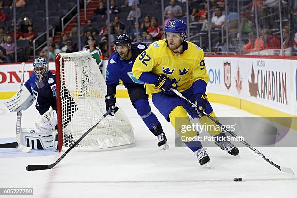 Gabriel Landeskog of Team Sweden skates past Andrej Sekera of Team Europe in the first period during the pre-tournament World Cup of Hockey game at...