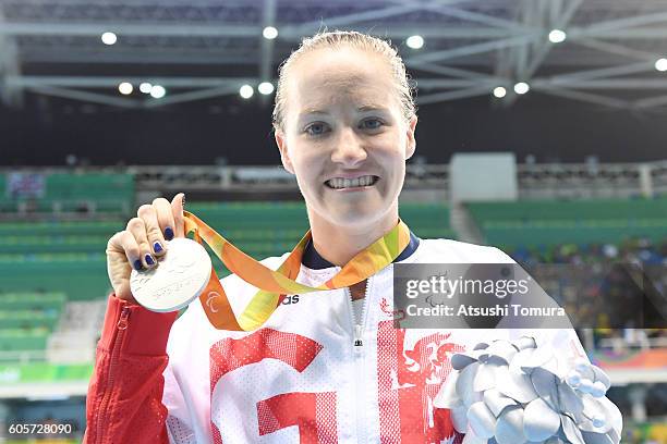 Silver medalist Claire Cashmore of Great Britain poses after medal ceremony for the Women's 100m Breaststroke SB8 on day 7 of the Rio 2016 Paralympic...