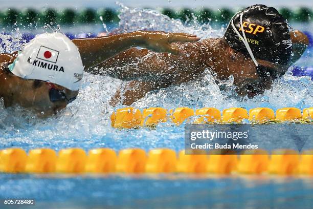 Keiichi Kimura of Japan, and Israel Oliver of Spain competes at the Mens 100m Butterfly - S11 Final during day 7 of the Rio 2016 Paralympic Games at...