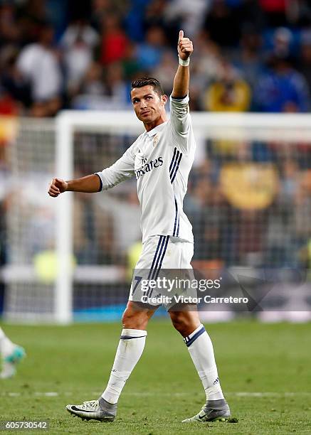 Cristiano Ronaldo of Real Madrid waves to the fans after the UEFA Champions League Group F match between Real Madrid CF and Sporting Clube de...