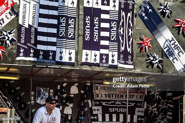 man selling tottenham football merchandise in kiosk, wembley, london, uk - soccer scarf stock pictures, royalty-free photos & images