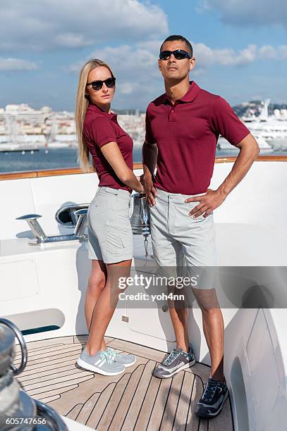 fashionable cool couple on luxury yacht - wine white color stock pictures, royalty-free photos & images