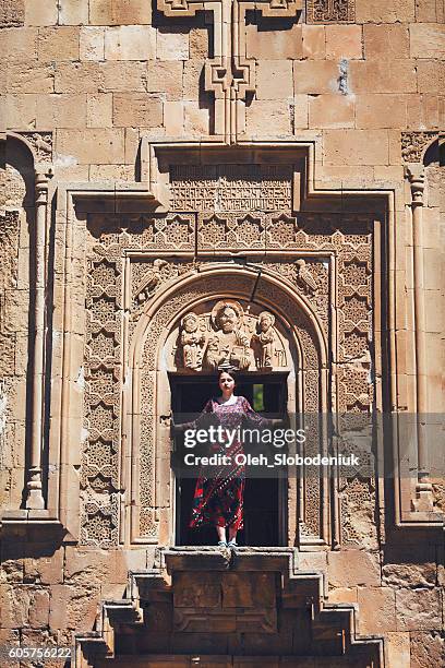 woman in the church - armenian church stock pictures, royalty-free photos & images