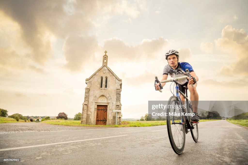 Caucasian man cycling outdoors