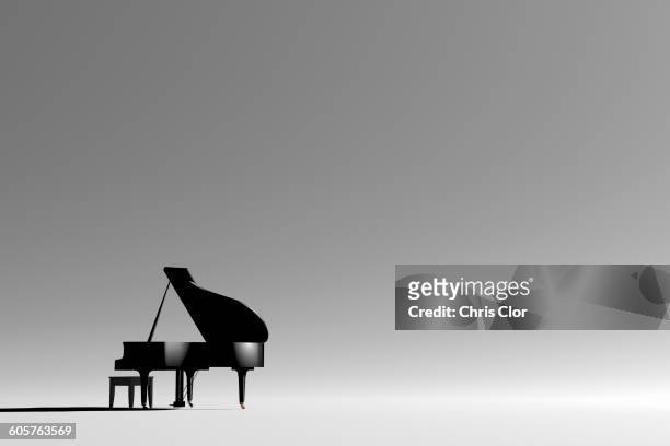 grand piano and bench in empty room - piano stock pictures, royalty-free photos & images