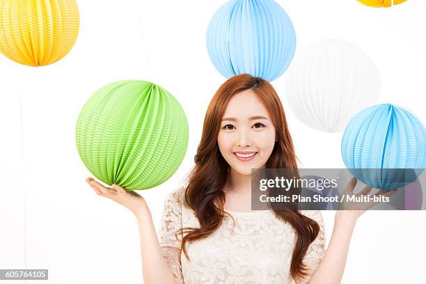 colorful paper balloons and woman - paper balloon photos et images de collection