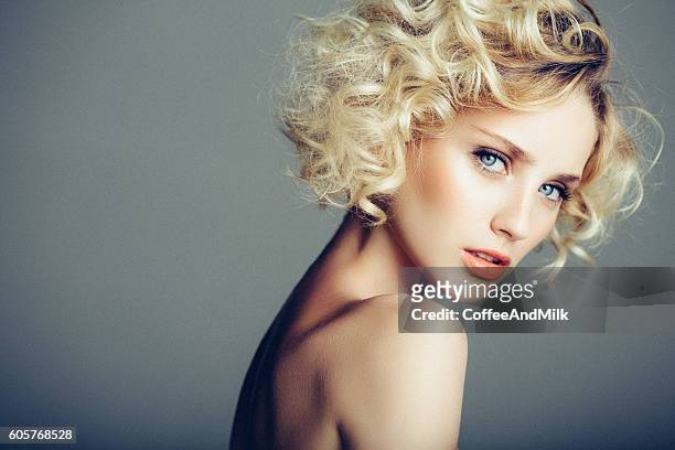 beautiful woman with stylish hairstyle - beautiful blondes stockfoto's en -beelden