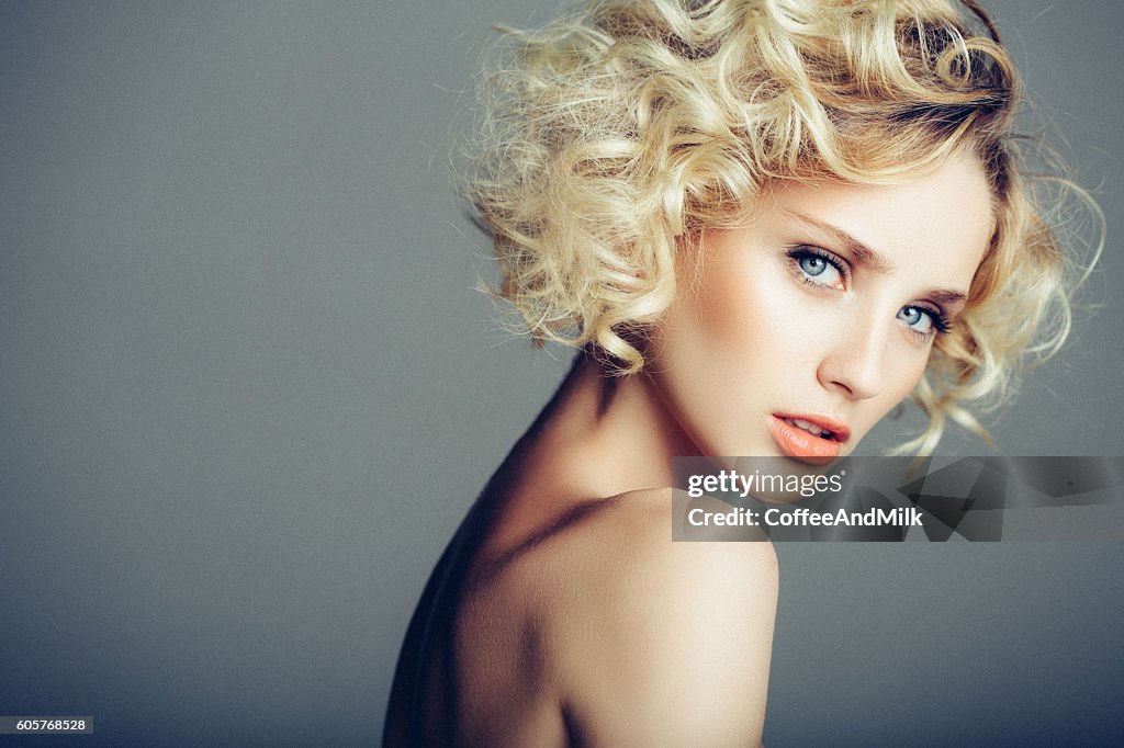 Beautiful woman with stylish hairstyle