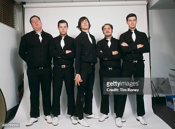 Swedish rock band The Hives, circa 2000. From left to right, they are Vigilante Carlstroem , Chris Dangerous , Howlin' Pelle Almqvist , Dr. Matt...