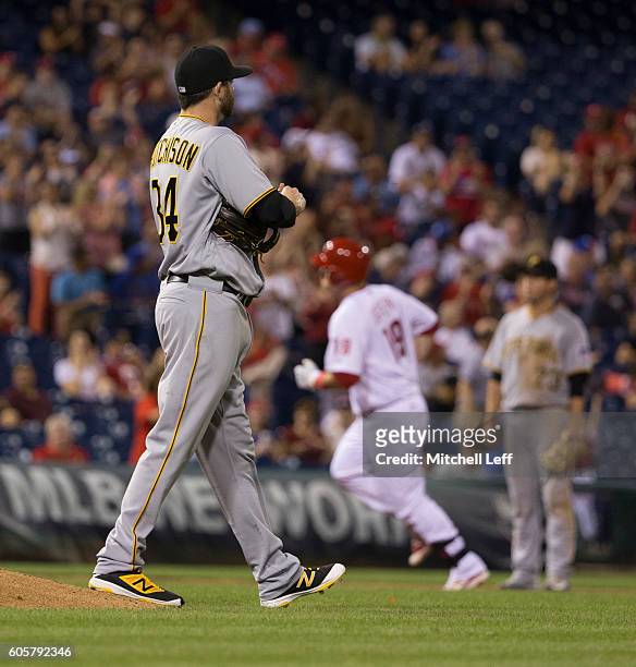 Drew Hutchison of the Pittsburgh Pirates walks off the mound after allowing a solo home run to Tommy Joseph of the Philadelphia Phillies in the...