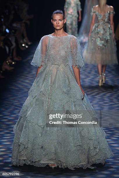 Model walks the runway wearing Marchesa Spring 2017 at The Dock, Skylight at Moynihan Station during New York Fashion Week on September 14, 2016 in...