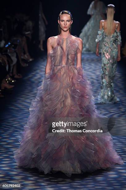 Model walks the runway wearing Marchesa Spring 2017 at The Dock, Skylight at Moynihan Station during New York Fashion Week on September 14, 2016 in...