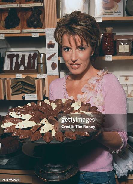 English newsreader and television presenter Natasha Kaplinsky in a chocolate shop, circa 2005.