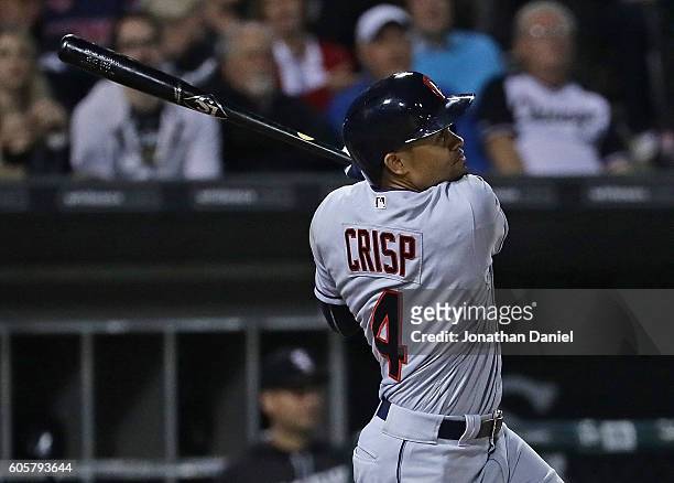 Coco Crisp of the Cleveland Indians hits a three run home run in the 6th inning against the Chicago White Sox at U.S. Cellular Field on September 14,...