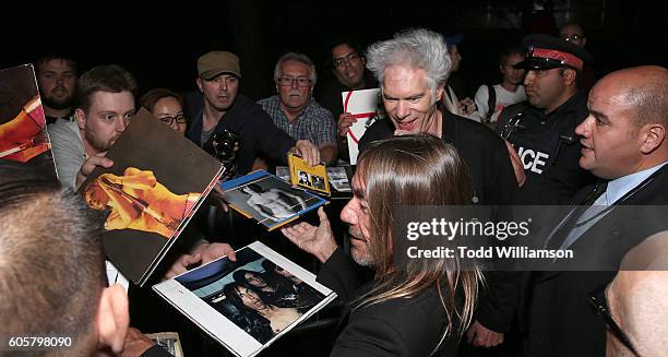 Iggy Pop and Jim Jarmusch sign autographs at the Premiere of Amazon Studios' "Gimme Danger" at the Toronto International Film Festival at Ryerson...