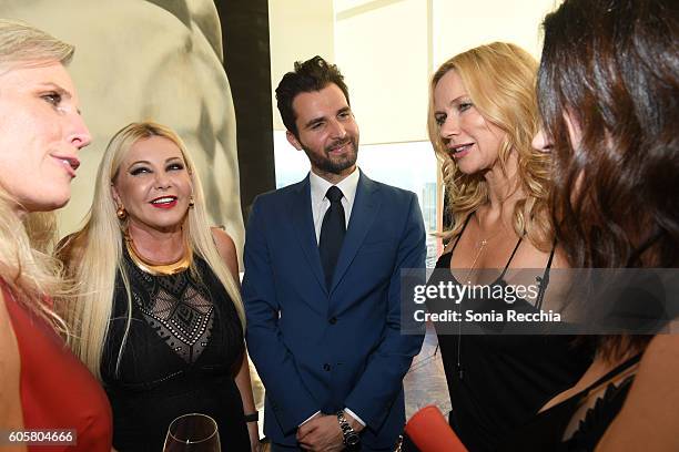 Pictures co-founders Monika Bacardi and Andrea Iervolino and actress Veronica Ferres attend "In Dubious Battle" cocktail reception at Shangri La...