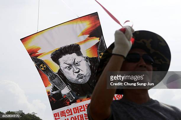 North Korean defector, now living in South Korea, prepares to release balloons carrying propaganda leaflets denouncing recent North Korea's nuclear...