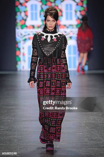 Bella Hadid walks the runway during the Anna Sui September 2016 New York Fashion Week: The Shows Spring 2017 season at The Arc, Skylight at Moynihan...