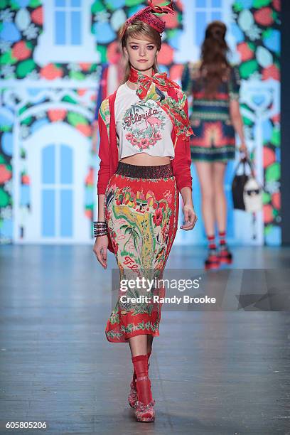 Model walks the runway during the Anna Sui September 2016 New York Fashion Week: The Shows Spring 2017 season at The Arc, Skylight at Moynihan...