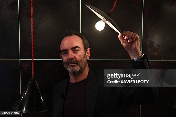 French actor Bruno Solo also known as Bruno Lassalle poses before the opening of the Festival of TV fiction in La Rochelle, western France. / AFP /...