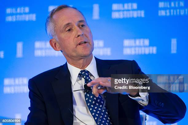 Gordon Fyfe, chief executive officer of British Columbia Investment Management Corp., speaks at the Milken Institute Asia Summit in Singapore, on...