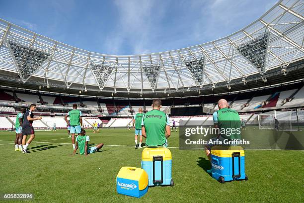 Players of West Ham United take a drink break during Training at The London Stadium on September 13, 2016 in London, England.