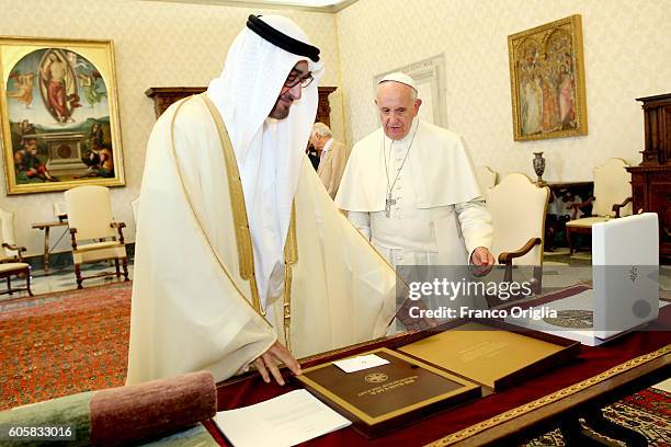 Pope Francis exchanges gifts with Sheikh Mohamed bin Zayed Al Nahyan, Crown Prince of Abu Dhabi and Deputy Supreme Commander of the UAE Armed Forces,...