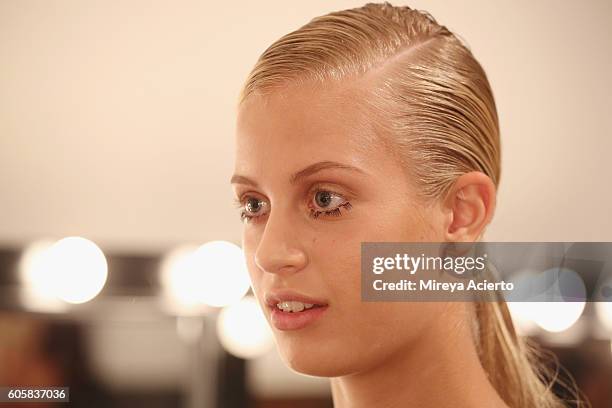 Model prepares backstage before the FrontRow fashion show during Style360 NYFW September 2016 at Metropolitan West on September 14, 2016 in New York...