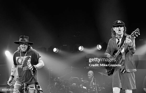 Singer Axl Rose and guitarist Angus Young of AC/DC perform during the AC/DC Rock Or Bust Tour at Madison Square Garden on September 14, 2016 in New...