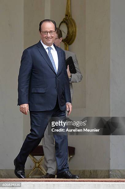 French President Francois Hollande is seen as German Chancellor Angela Merkel leaves the Elysee Palace after a meeting on September 15, 2016 in...