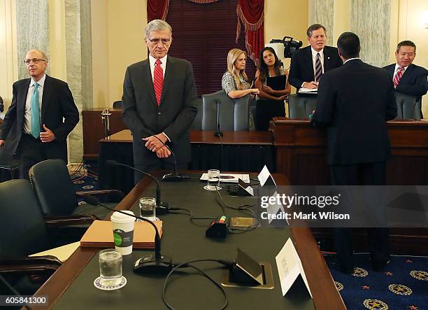 Chairman Tom Wheeler waits to testify before the Senate Commerce, Science and Transportation Committee on Capitol Hill, September 15, 2016 in...