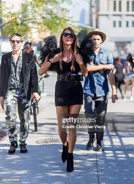 Anna dello Russo wearing a black dress outside Michael Kors on September 14, 2016 in New York City.