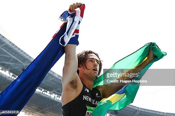 Liam Malone of New Zealand celebrates after winning the Men's 400m T44 final and setting a new world record of 46.20 seconds on day 8 of the Rio 2016...