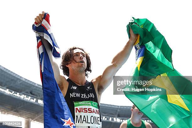 Liam Malone of New Zealand celebrates after winning the Men's 400m T44 final and setting a new world record of 46.20 seconds on day 8 of the Rio 2016...